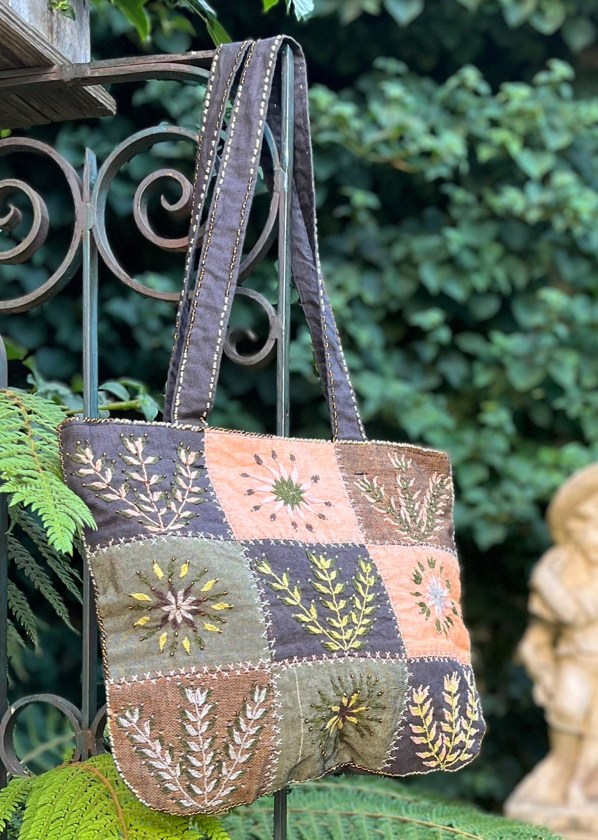 Green hand embroidered handbag