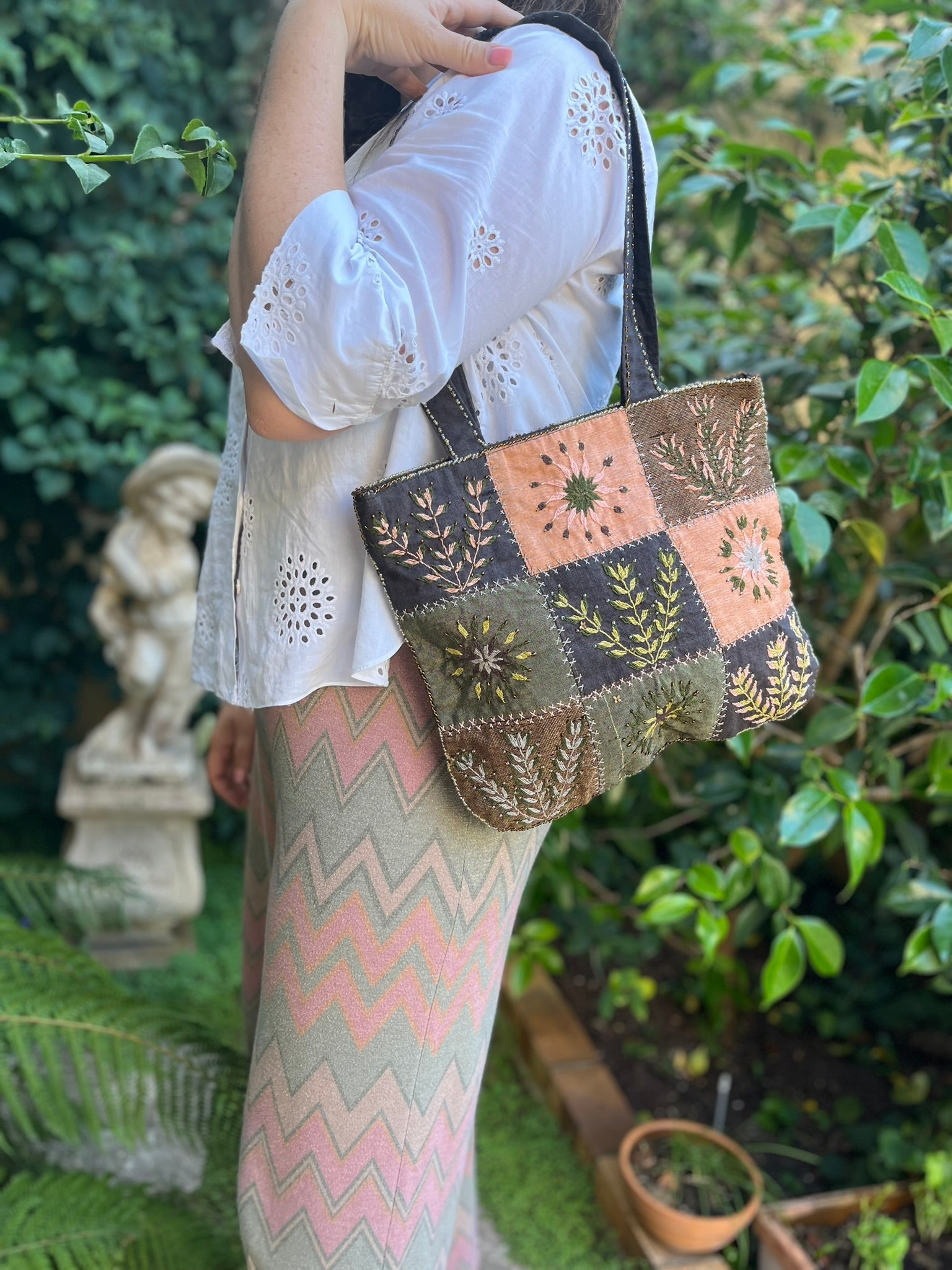 Green hand embroidered handbag